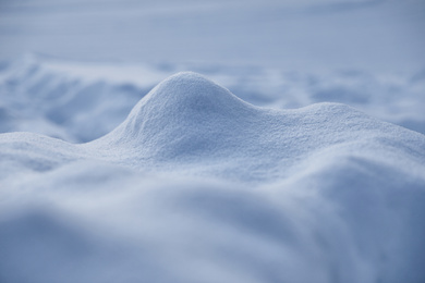 Beautiful snowdrift as background, closeup view. Winter weather
