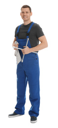 Full length portrait of professional auto mechanic with lug wrench and rag on white background