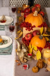 Beautiful autumn place setting and decor on table