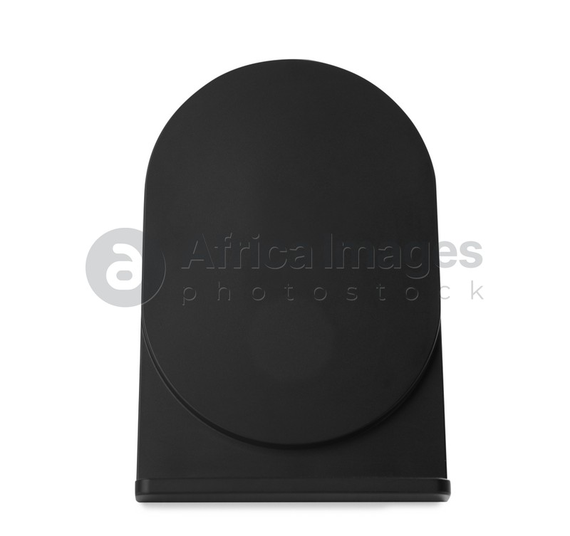 Photo of Black wireless charger isolated on white. Modern technology