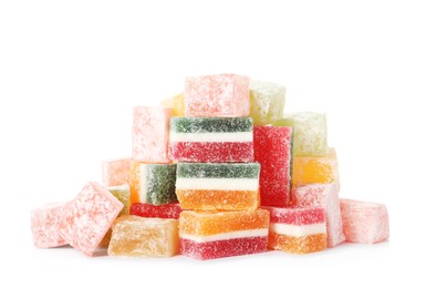 Pile of different tasty sweets on white background
