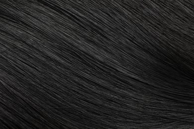 Beautiful black hair as background, closeup view