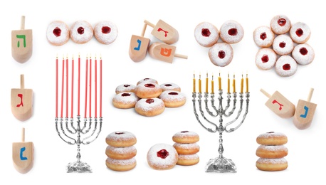 Set with wooden dreidels, doughnuts and silver menorahs on white background. Hanukkah celebration