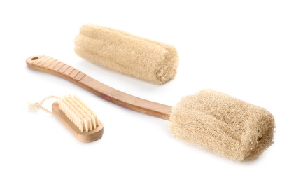 Natural shower loofah sponges and brush isolated on white