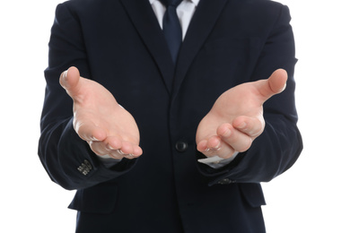 Businessman holding something against white background, focus on hands