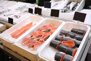 Fresh fish on display with ice at wholesale market