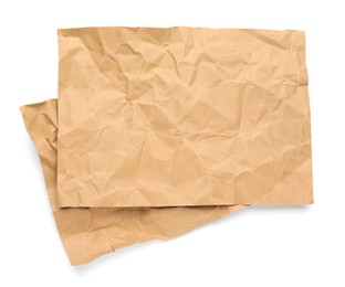 Sheets of crumpled brown paper on white background, top view