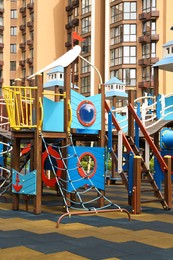 Photo of Empty outdoor children's playground in residential area