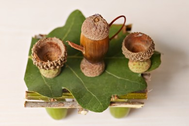 Photo of Tea set composition made of natural materials on white wooden table