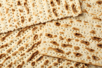 Traditional Matzos as background, top view. Pesach (Passover) celebration