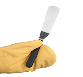 Chef in oven glove holding spatula on white background, closeup