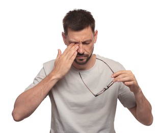 Man suffering from eyestrain on white background