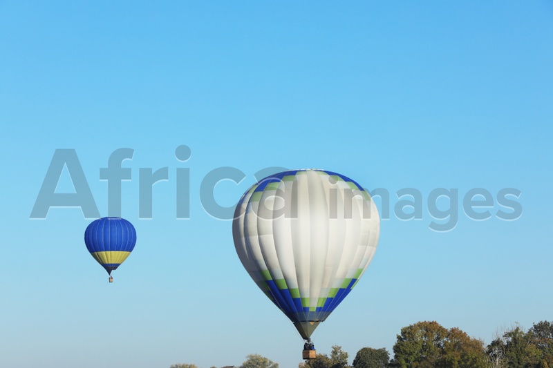 Beautiful view of hot air balloons in blue sky
