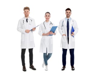 Collage with photos of young doctors on white background