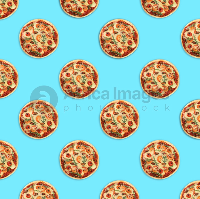Many delicious seafood pizzas on turquoise background, flat lay. Seamless pattern