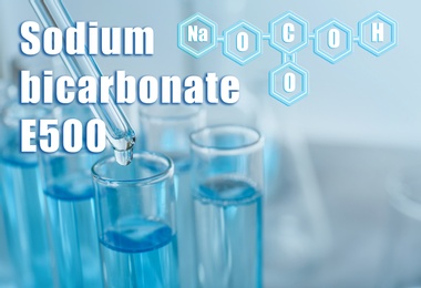 Text Sodium bicarbonate E500 with soda formula and test tubes on background