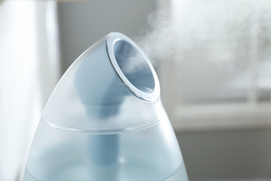 Modern air humidifier at home, closeup view