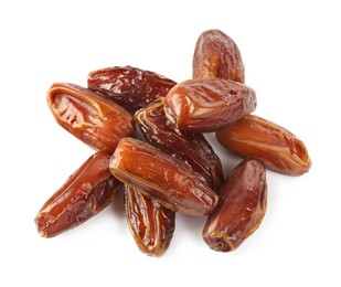 Heap of tasty sweet dried dates on white background, top view