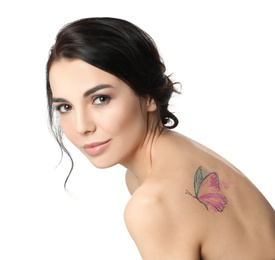 Image of Young woman with colorful tattoo of butterfly on her body against white background