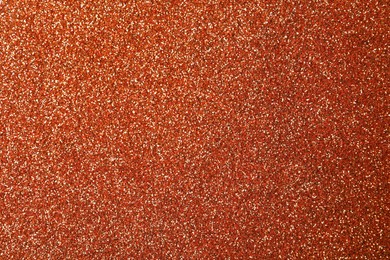 Beautiful shiny copper glitter as background, closeup