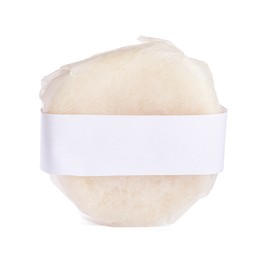 Solid shampoo bar wrapped in parchment isolated on white