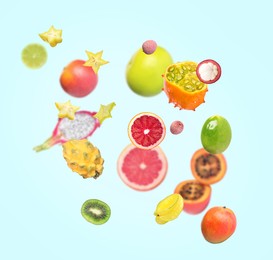 Different tasty exotic fruits flying on turquoise background