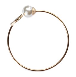 Elegant golden bracelet with pearl isolated on white, top view