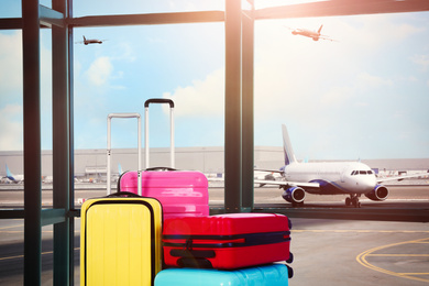 Travel suitcases in airport terminal. Summer vacation