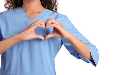 African-American doctor making heart with hands on white background, closeup
