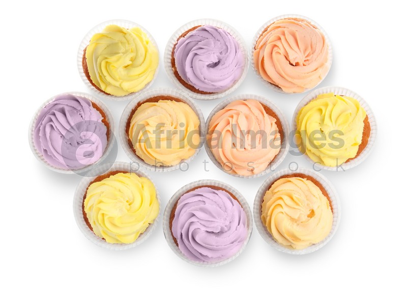Photo of Tasty cupcakes with cream isolated on white, top view