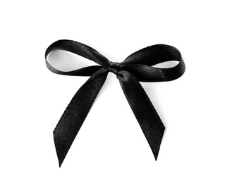 Black ribbon bow on white background. Funeral accessory