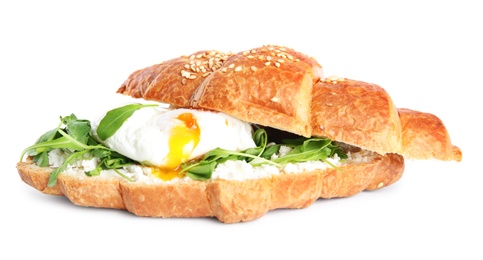 Delicious croissant with arugula and egg isolated on white