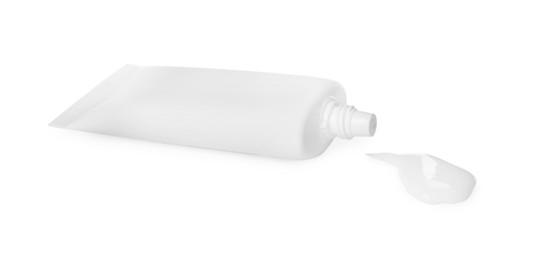 Tube with squeezed hand cream on white background