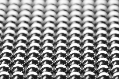 Small metal magnetic balls as background, closeup