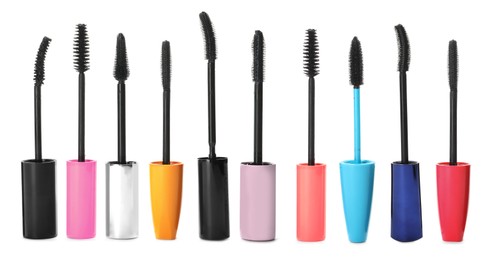 Image of Set with different mascara wands on white background. Banner design