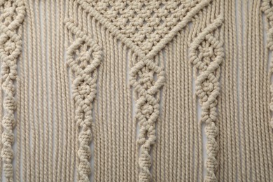 Photo of Texture of beautiful macrame as background, top view. Decorative element