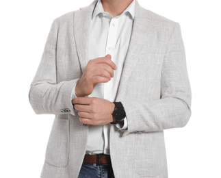 Businessman in jacket posing on white background, closeup