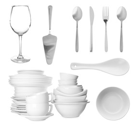 Set with different clean dishware and cutlery on white background