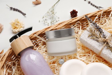 Spa gift set with different personal care products on white table, closeup