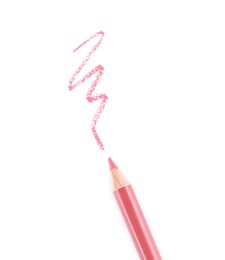 Bright lip liner stroke and pencil on white background, top view
