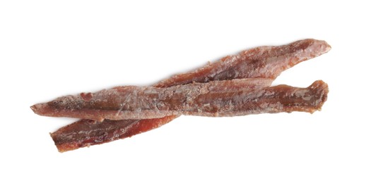 Photo of Delicious anchovy fillets on white background, top view
