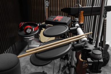 Electronic drum set at recording studio. Music band practice