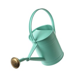 Photo of Turquoise metal watering can isolated on white