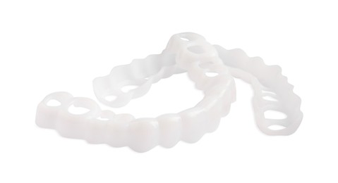 Photo of Dental mouth guards on white background. Bite correction