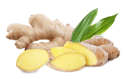 Aromatic fresh ginger with green leaves on white background 