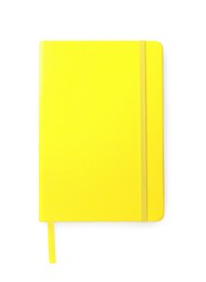 Closed yellow office notebook isolated on white, top view