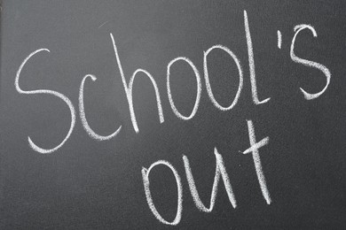 Photo of Words School's Out on blackboard. Summer holidays