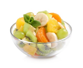 Delicious fresh fruit salad in glass bowl on white background