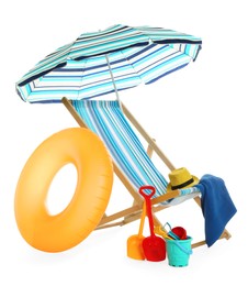 Beach umbrella, deck chair, inflatable ring, hat, towel and child's sand toys on white background