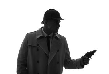Old fashioned detective with revolver on white background